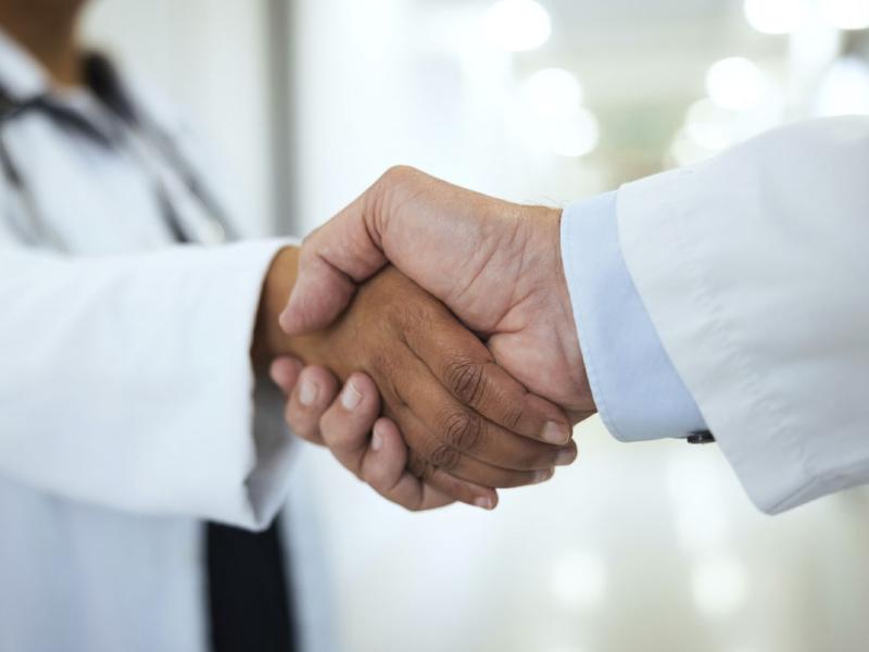 Two people shaking hands