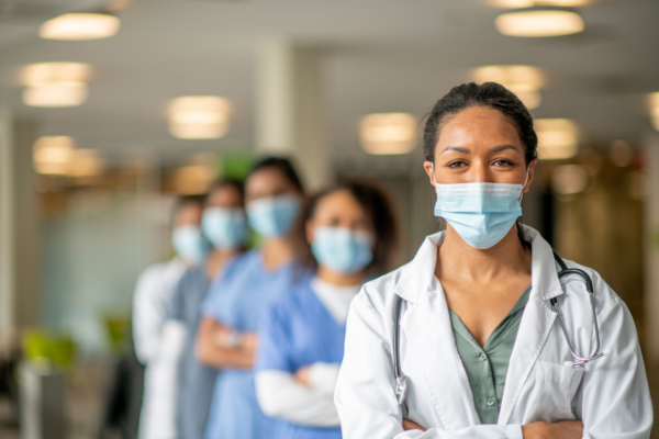Group of medical professionals standing in a row