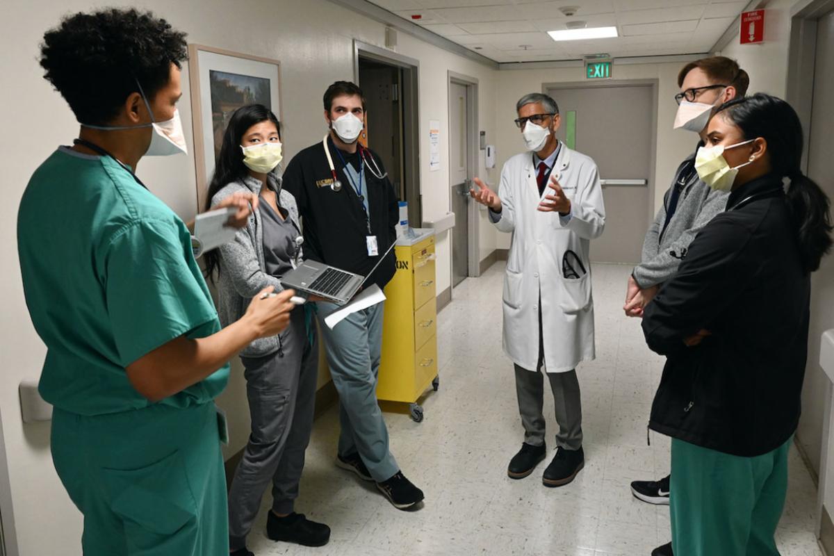 Mark C. Henderson, MD, with University of California, Davis, health-professional trainees