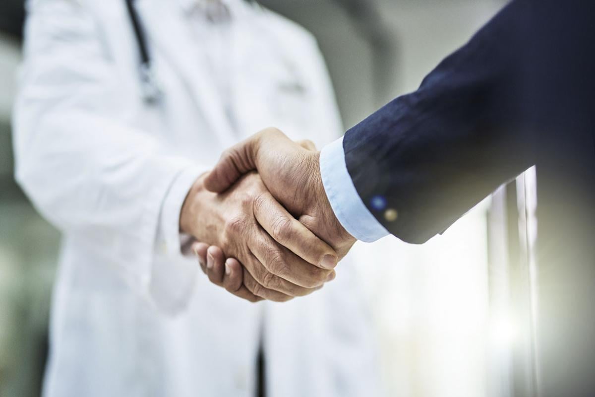 Two people shaking hands