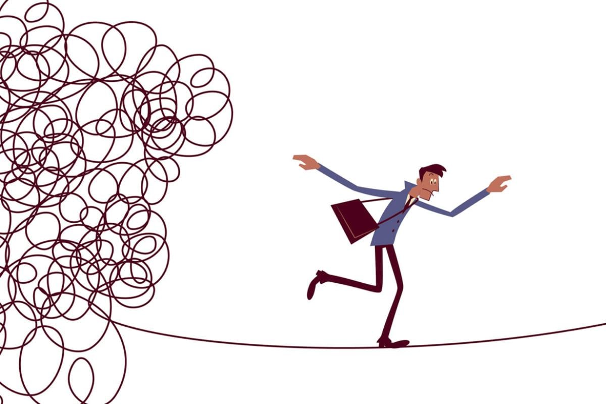 Figure walks on a tightrope